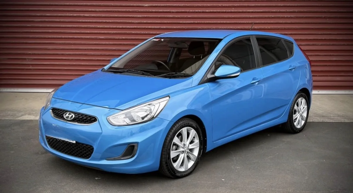 Blue rental vehicle available through Domain Services CL